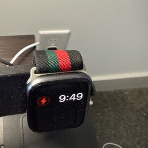 Apple Watch Series 6 with striped sports band.